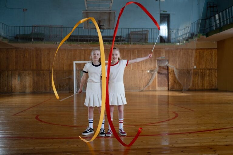 Atletas da ginástica rítmica brasileira celebrando medalhas no Campeonato Mundial