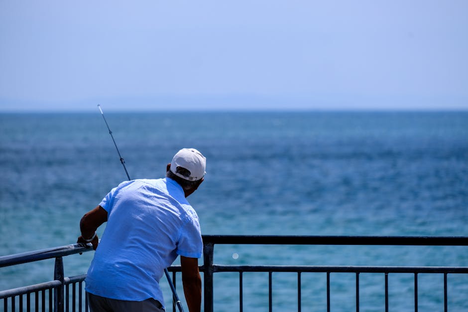 turistas pescam peixe gigante